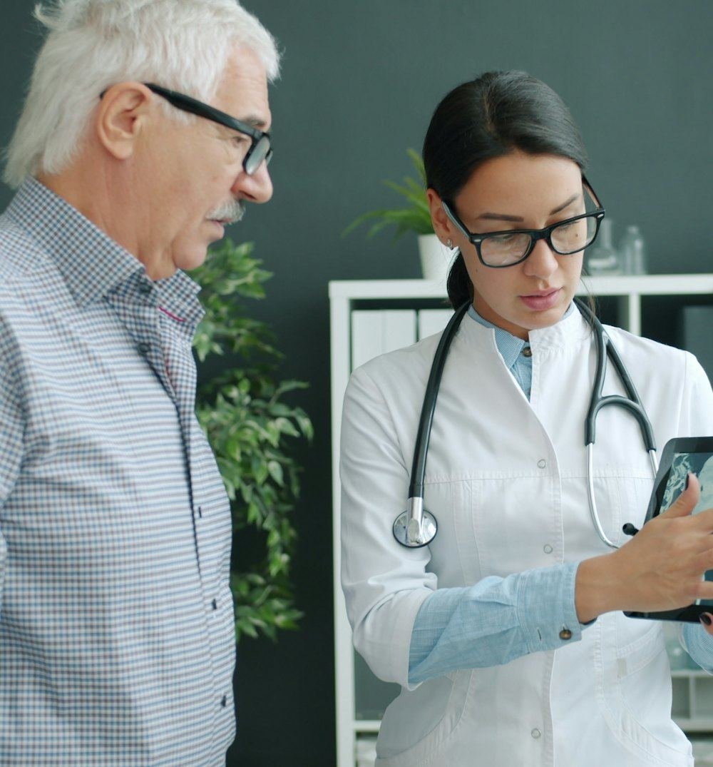 Senior doctor mentoring a young doctor
